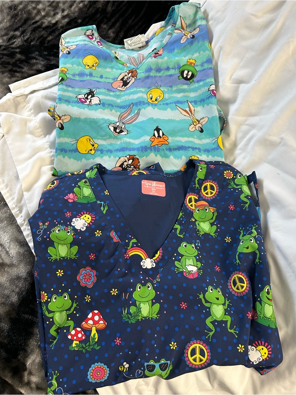 Lot of 2 Scrub tops looney toons and peace frogs